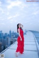 Beauty Crystal Lee ventured into blooming on the roof of a high-rise building (8 photos)